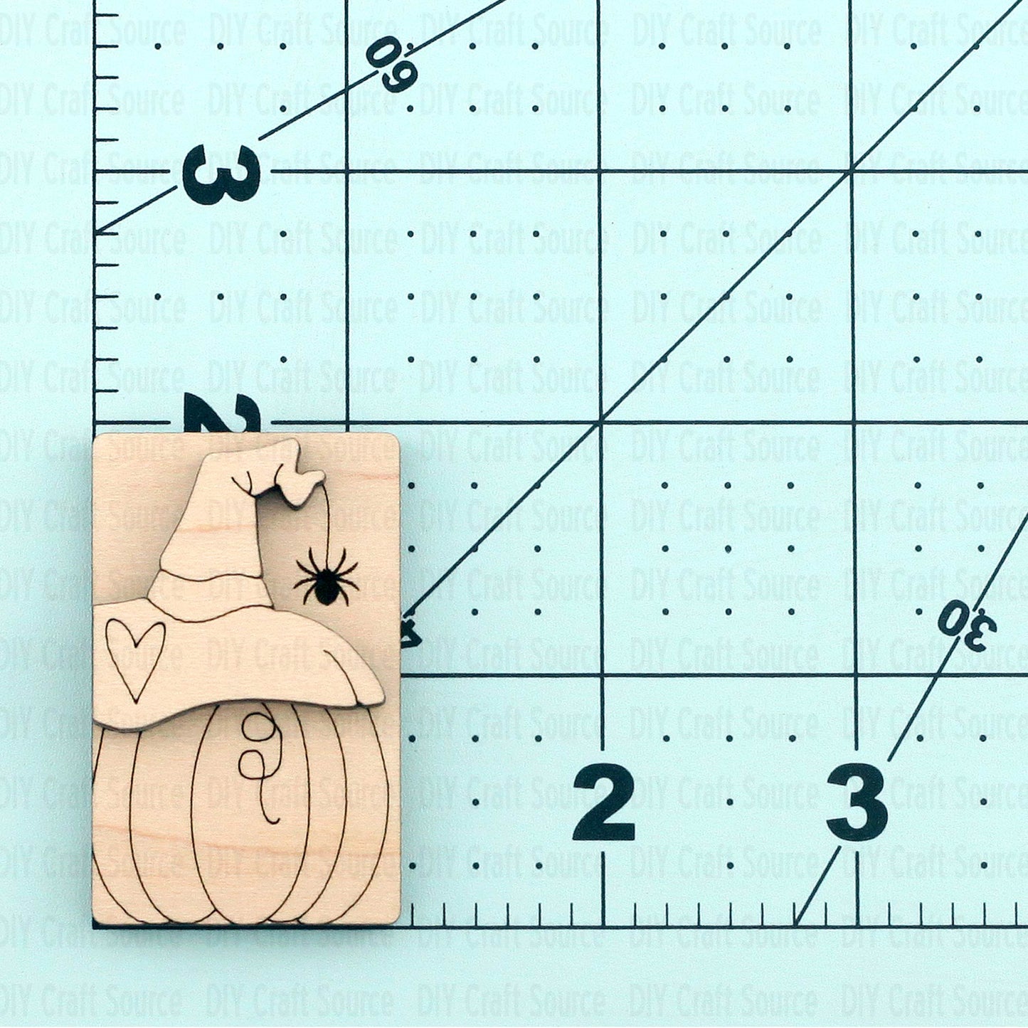 Wooden laser blank with a pumpkin and spider is ready to paint for hair clip