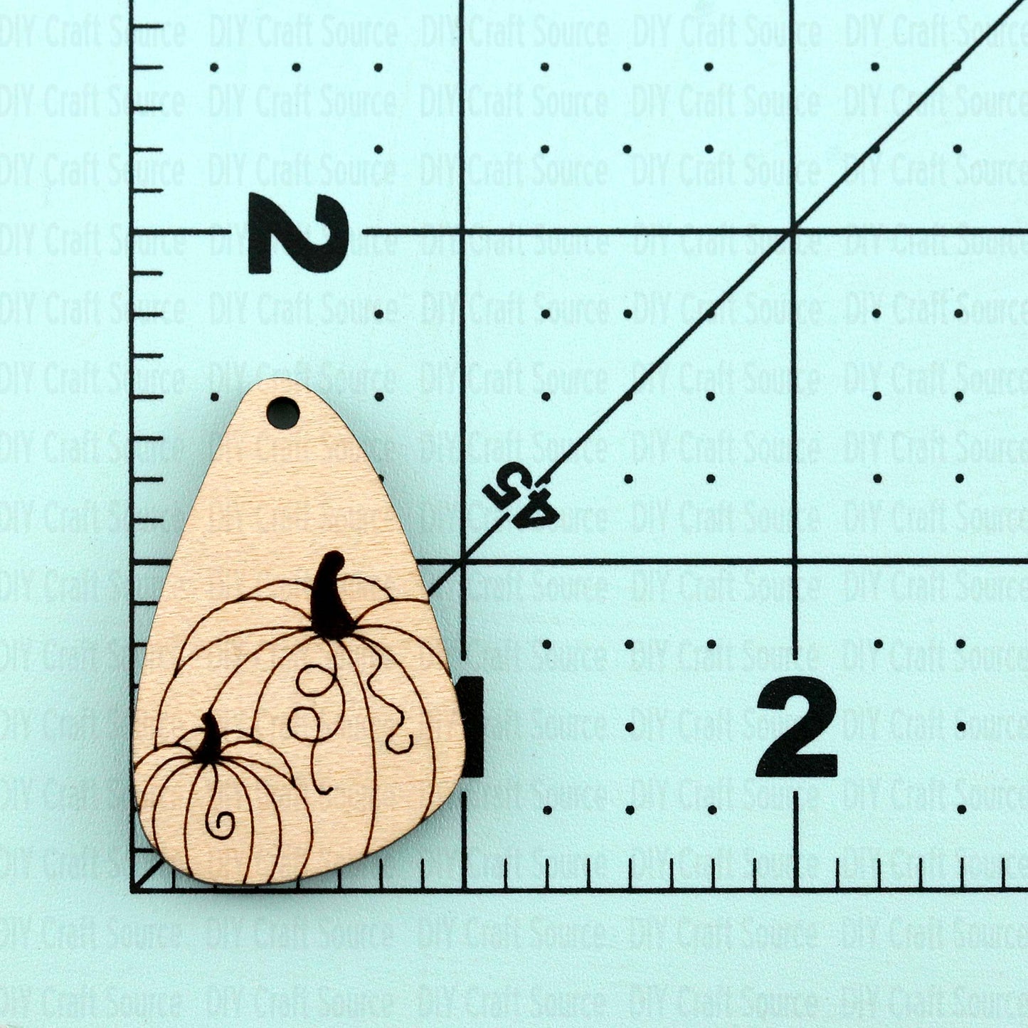 Wooden pumpkin-shaped laser blank earrings are ready to paint