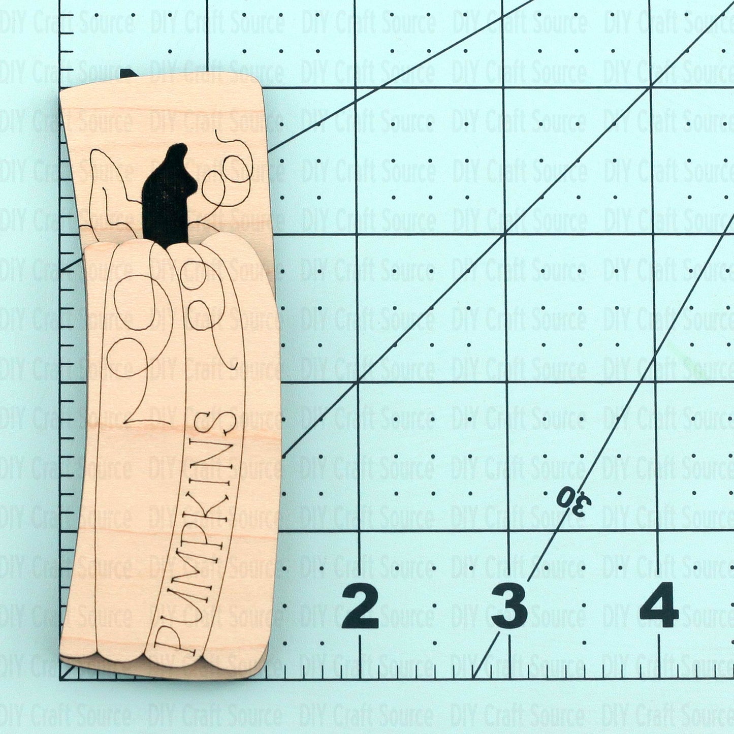 Wooden pumpkin laser blank with 'Pumpkins' text for a hair clip