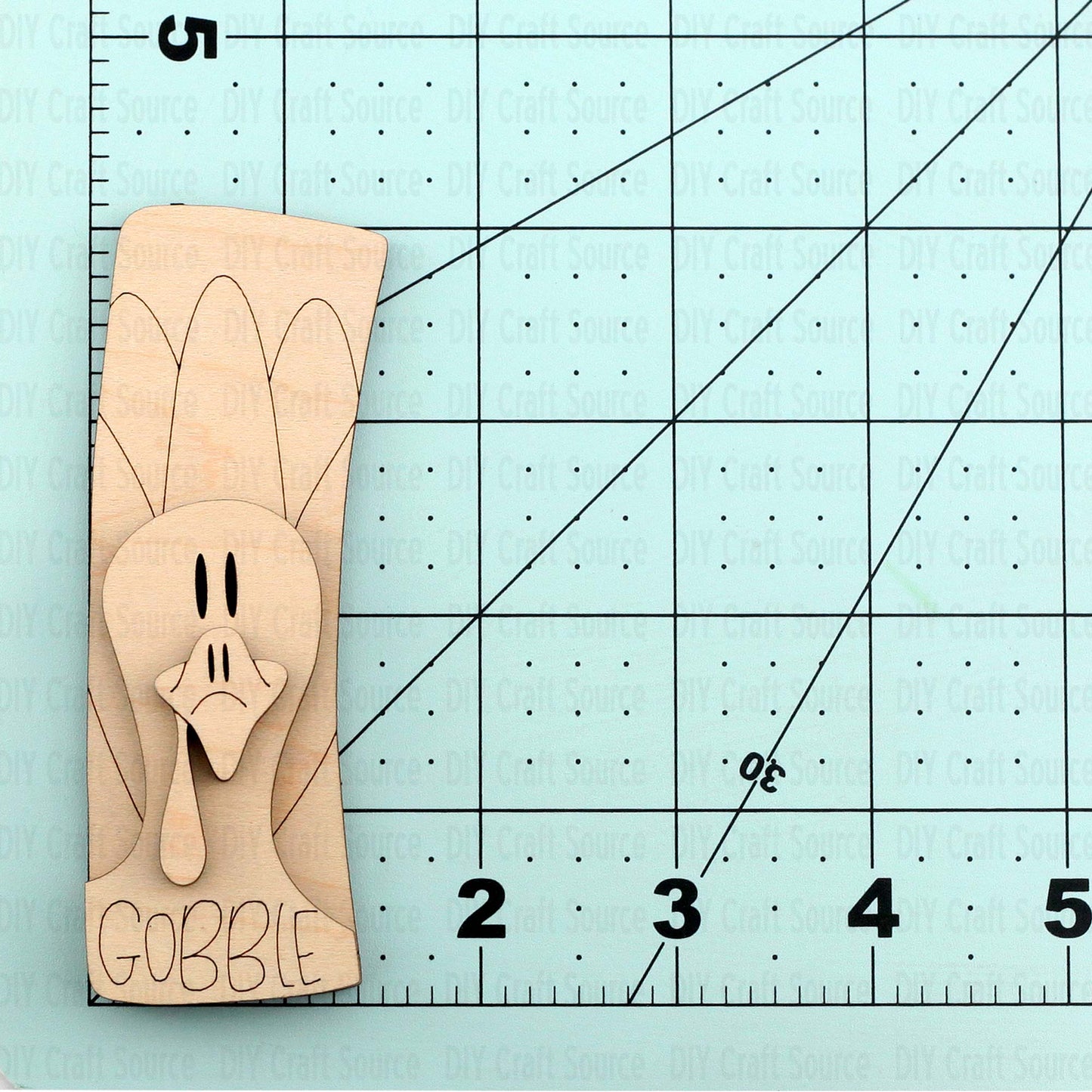 Wooden laser blank hair clip design shaped like a turkey with 'Gobble' text.