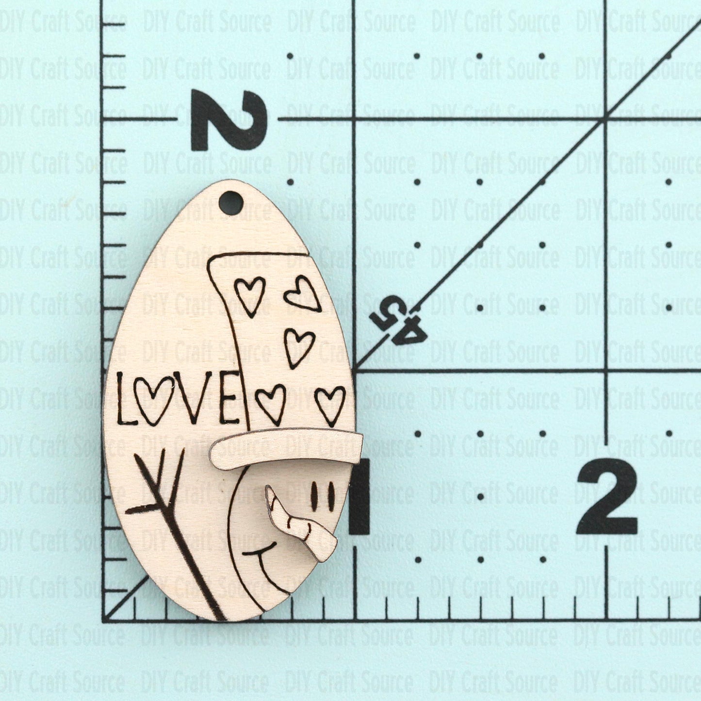 Unfinished wood blank earrings with snowman and hearts for Valentine's Day, ready to paint or stain.