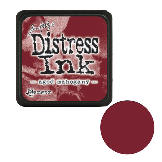 Distress Ink pad with 'aged mahogany' color swatch on a white background