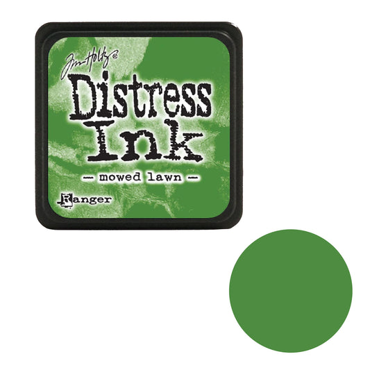 Tim Holtz Distress Ink pad with a green swatch on a white background