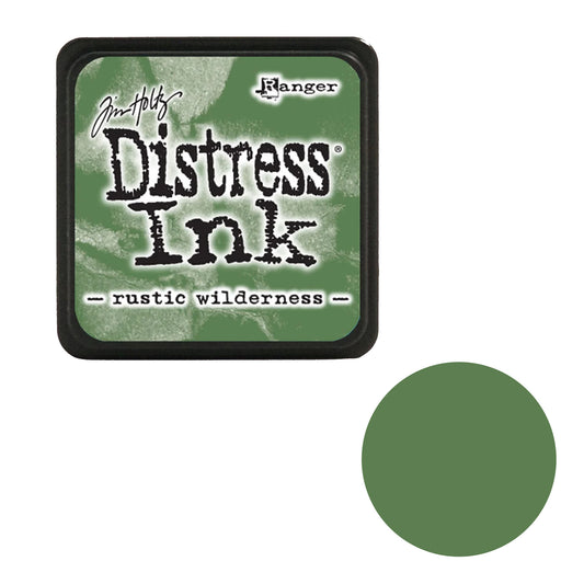 Tim Holtz Distress Ink pad by Ranger with 'rustic wilderness' color swatch on a white background