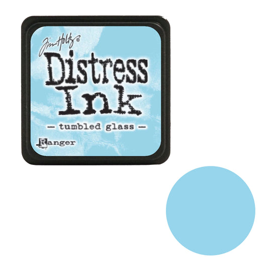 Tim Holtz Distress Ink pad for tumbled glass color with a blue circle on a white background