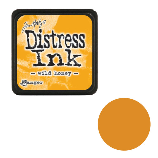 Tim Holtz Distress Ink pad with 'wild honey' color swatch on a white background