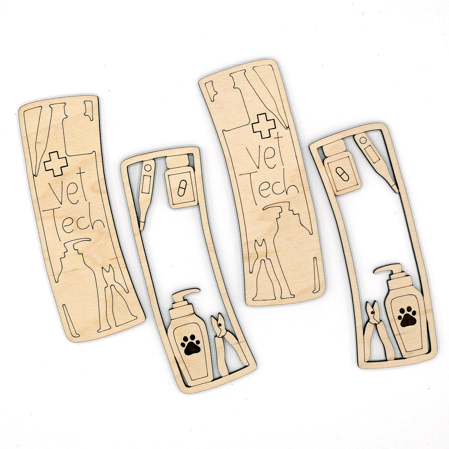 Wooden claw clip blanks with 'Vet Tech' design on a white background