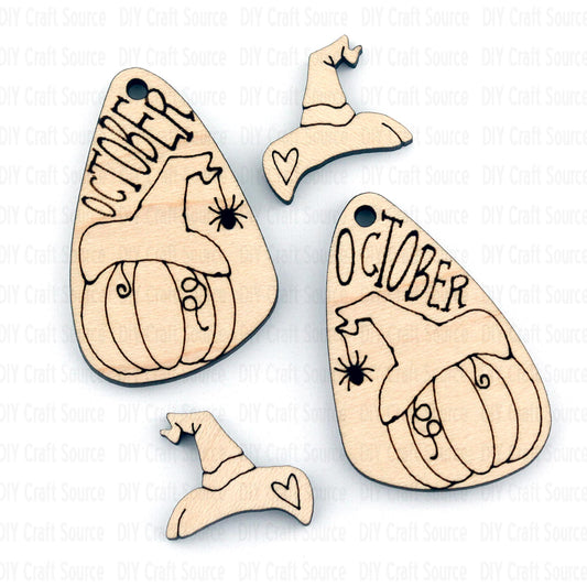 Wooden Halloween-themed laser blanks with 'October' text and pumpkin designs are ready to paint for earrings