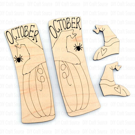 Wooden cutouts with 'October' text and Halloween-themed designs on a laser cut blank that is ready to paint for a diy hair clip project