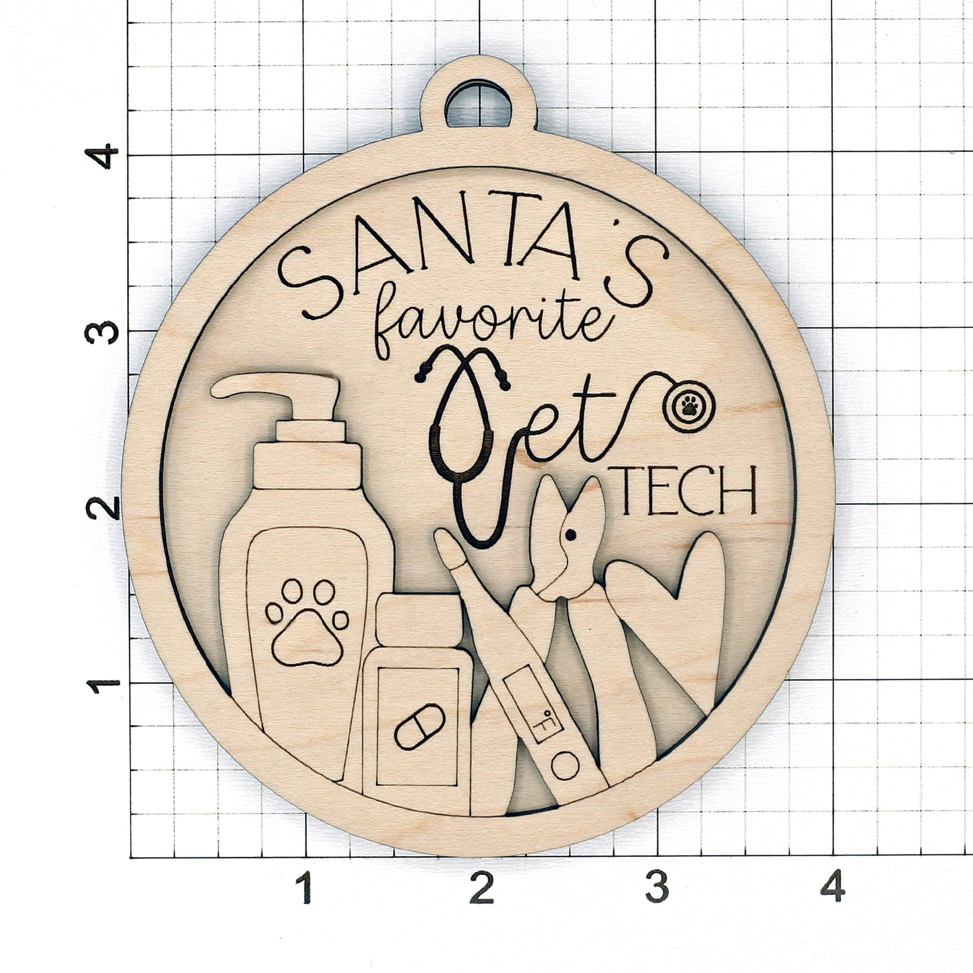 Wooden ornament blank with 'Santa's favorite vet tech' text and medical tools on a grid background