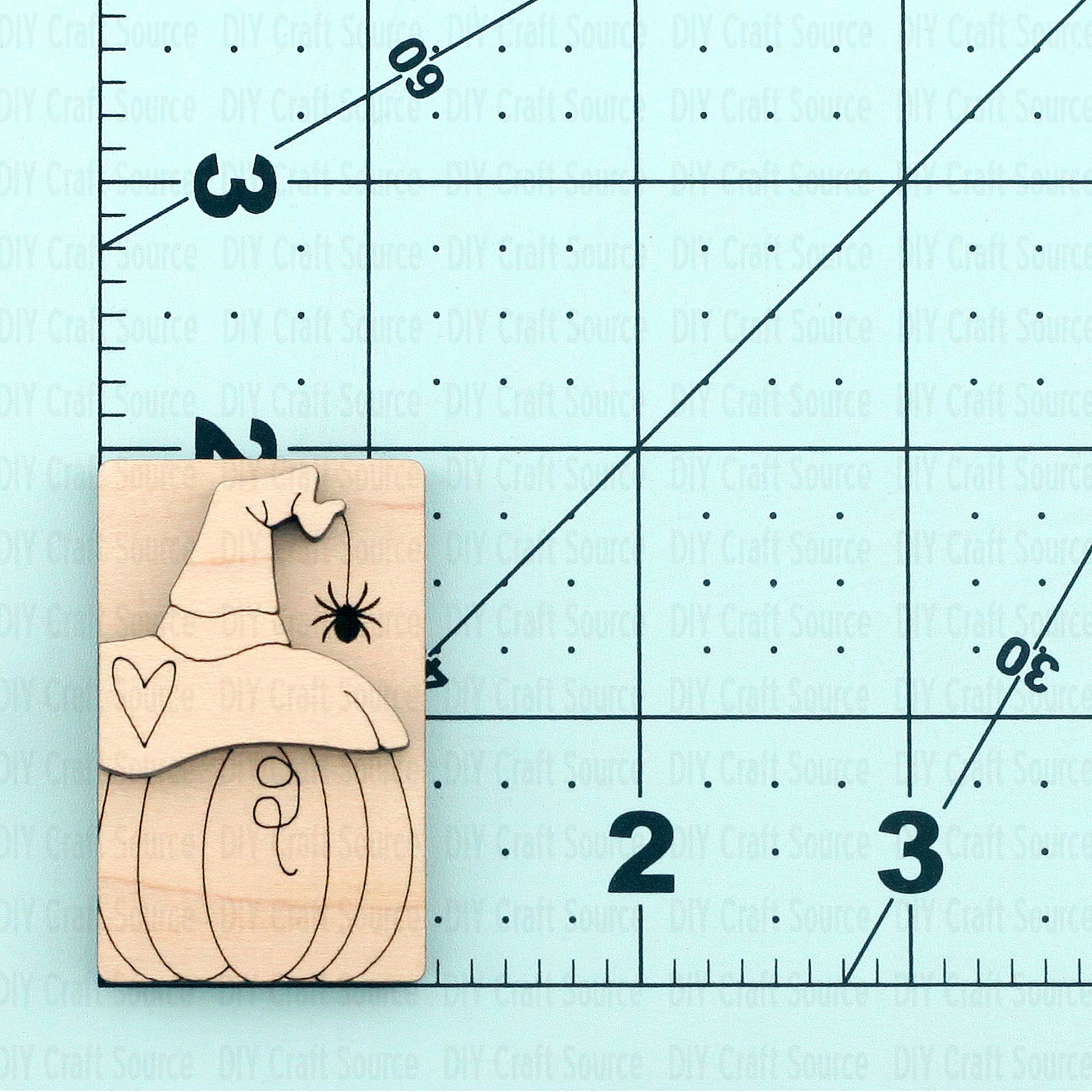Wooden laser blank with a pumpkin and spider is ready to paint for hair clip