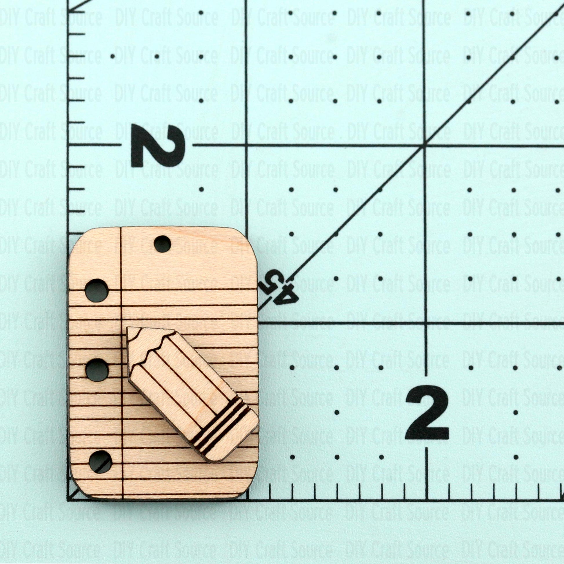 Wooden laser-cut pencil design on earrings that are ready to paint