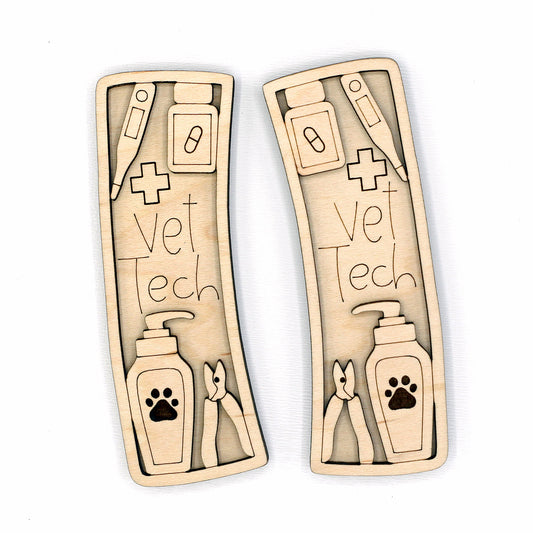 Wooden hair clip pieces with 'Vet Tech' design on a white background