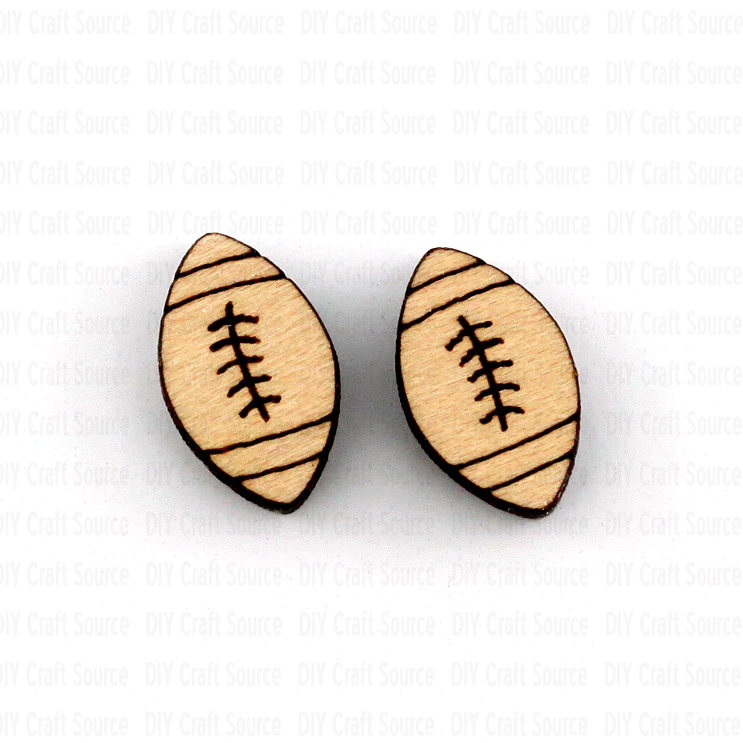Wooden football-shaped blank earring studs on a white background that are ready to paint.