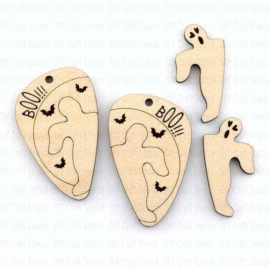 Wooden Halloween earrings with ghost and ghostly figure shapes on a white background that are ready to paint