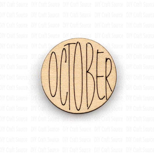 Round wooden bracelet blank with 'OCTOBER' engraved
