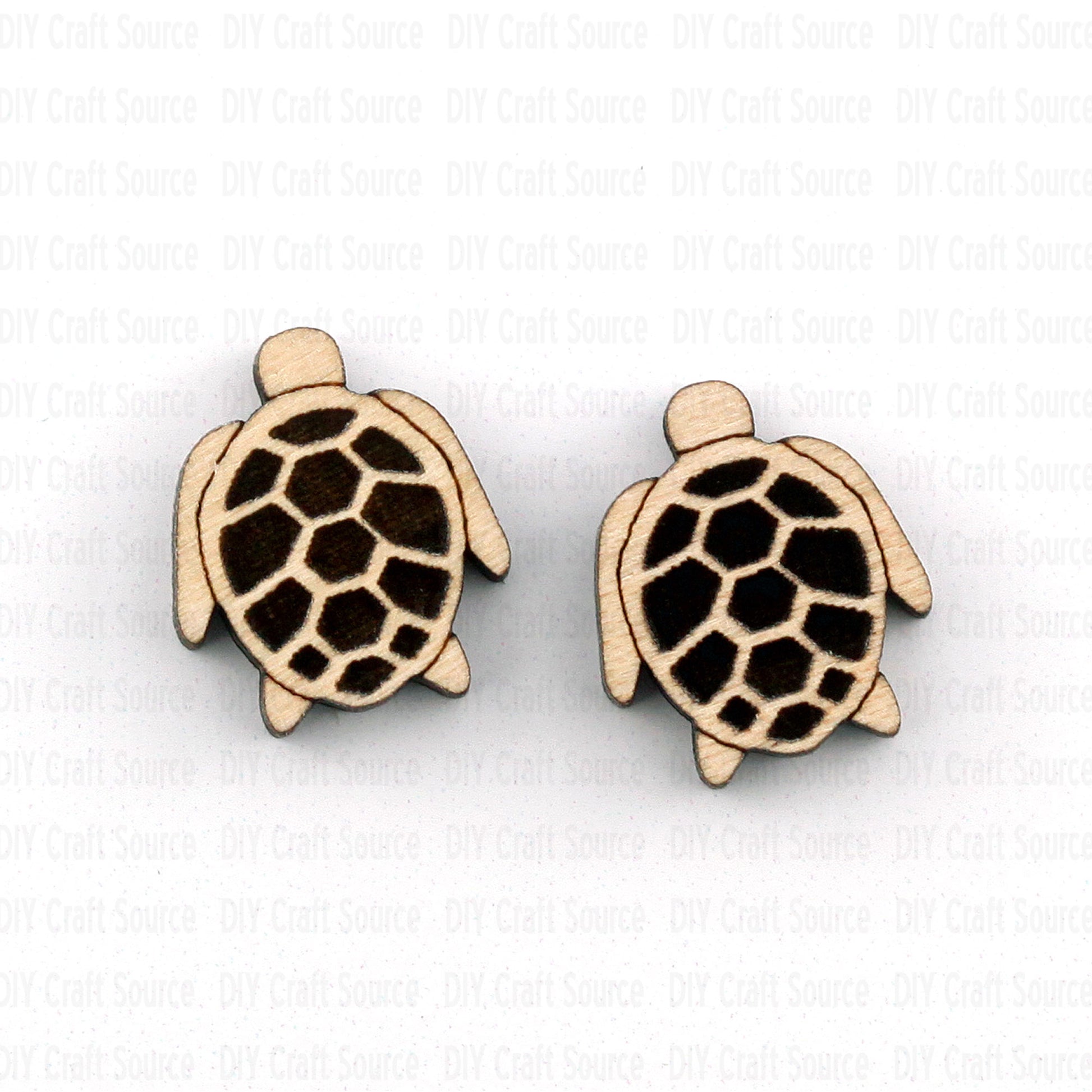 Pair of turtle-shaped stud earrings that are ready to paint